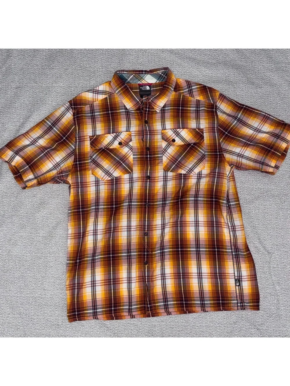 The North Face orange brown plaid short sleeve button down shirt size Large